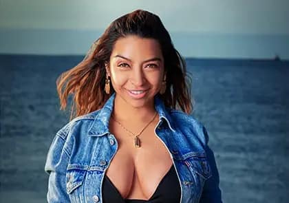 Maternity boudoir photography in Chicago with elegant blue dress