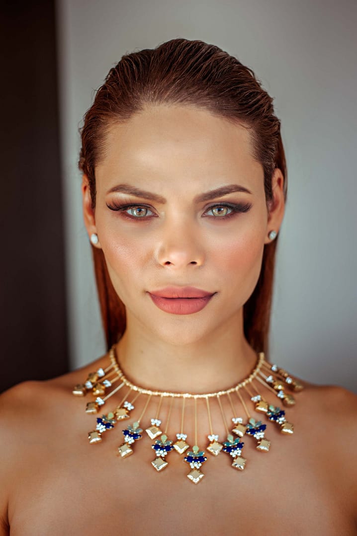 Empowering female portrait with elegant makeup and gold necklace — photographed by Nickolaus21 in Chicago