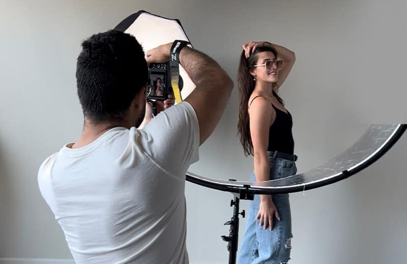 Guided posing during a boudoir photography session in Chicago
